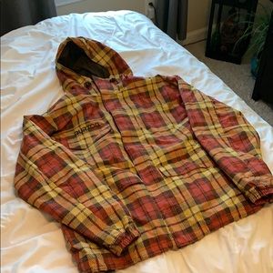 Button ski coat. Red and yellow plaid